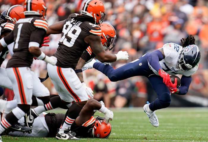 Tennessee Titans running back Derrick Henry (22) carries the ball during the second quarter in Cleveland, Ohio.